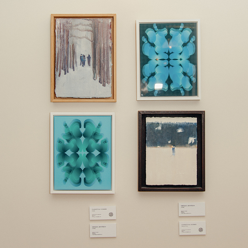 Paintings hung on a wall